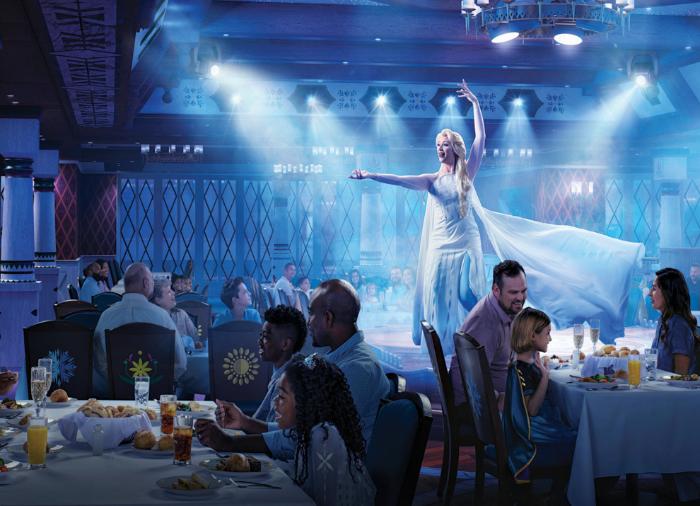 A graceful performer in a white flowing dress levitates dramatically over a cruise ship dining room, surrounded by passengers enjoying a meal under blue stage lighting.